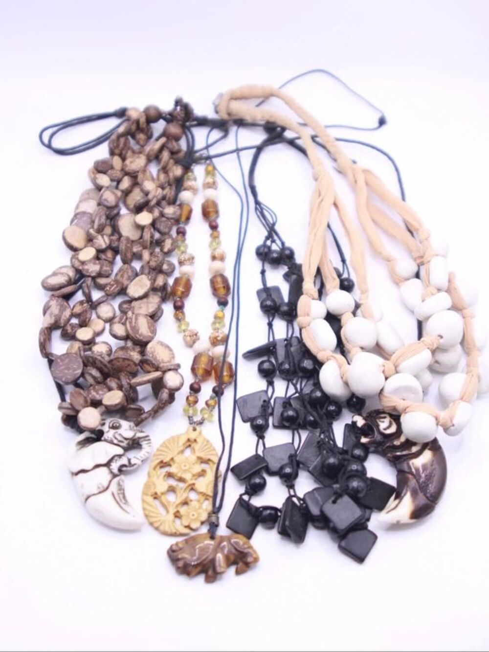 Lot of wood and carved accent necklaces